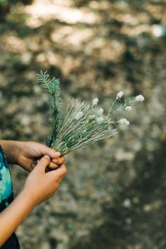 day camper with their bouquet of greenery